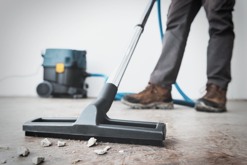 What are the steps in post-construction cleaning